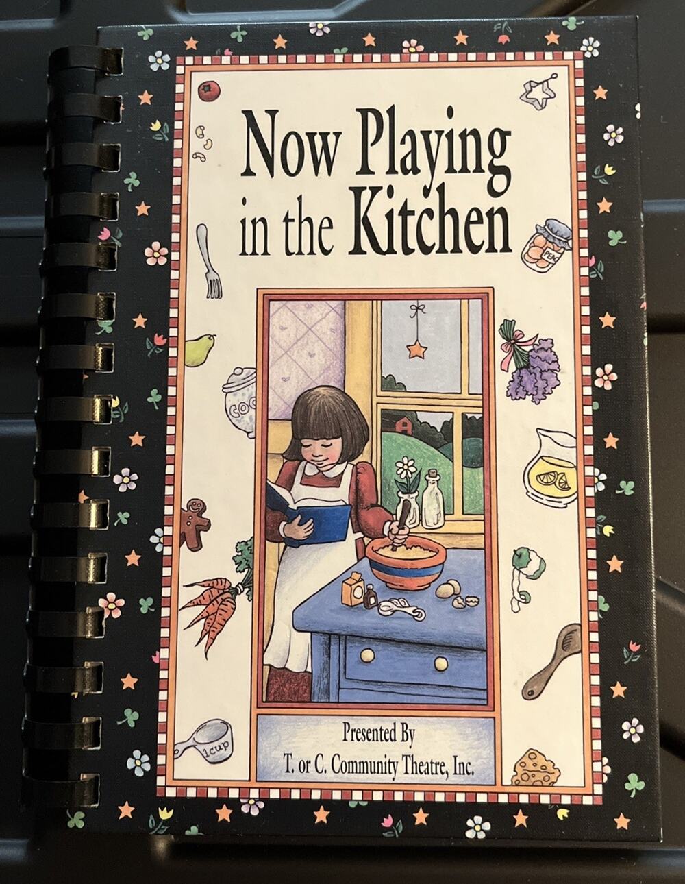 Cook book Now playing in the kitchen by Morris press copyright 2000 Never Used